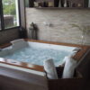 Bañera JACUZZI© con hidromasaje Jacuzzi© Aura Wood 192x166